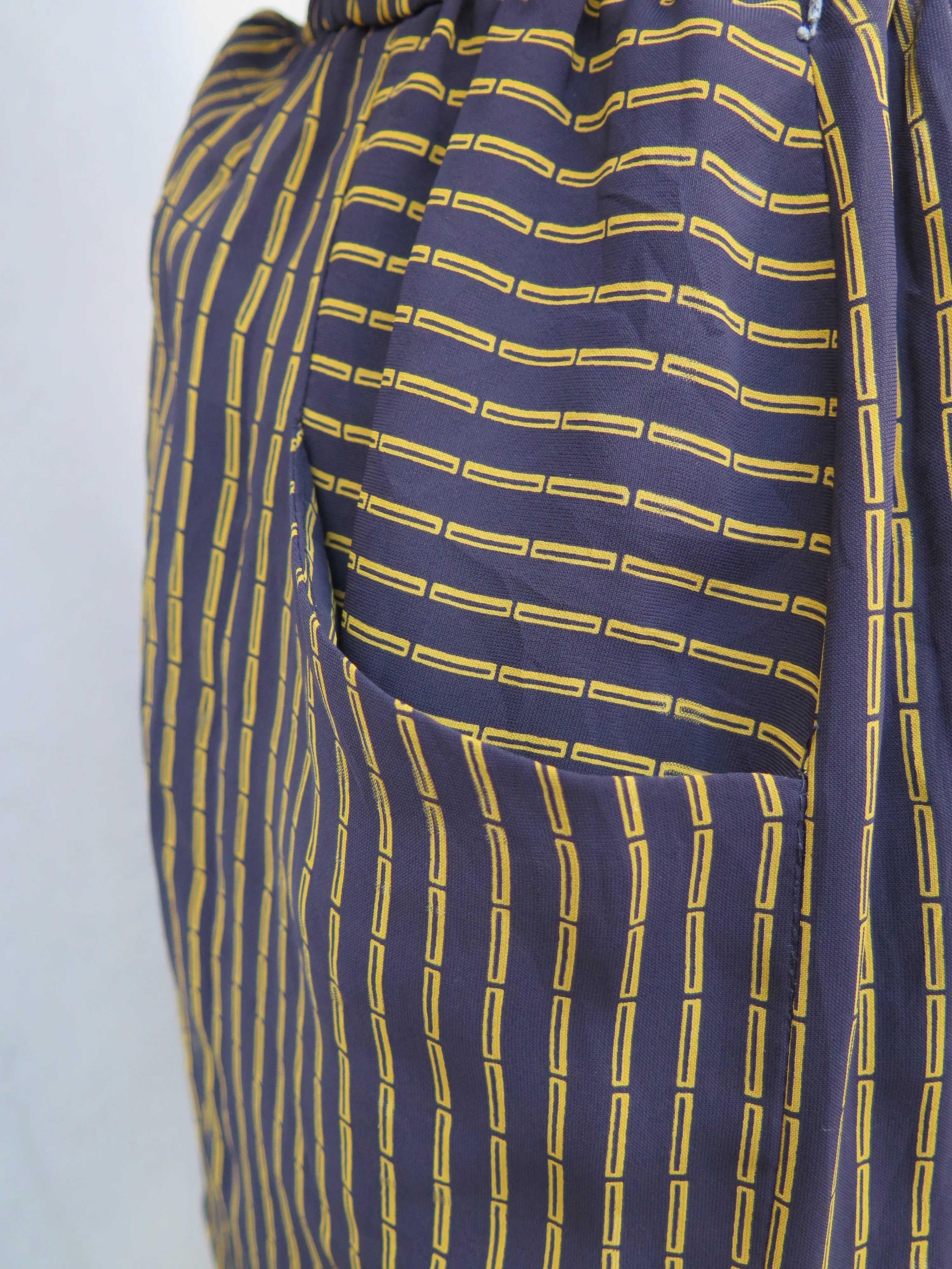 Bambi | Vintage 1060s 1970s Black yellow bamboo stripes black dress with Yellow buttons