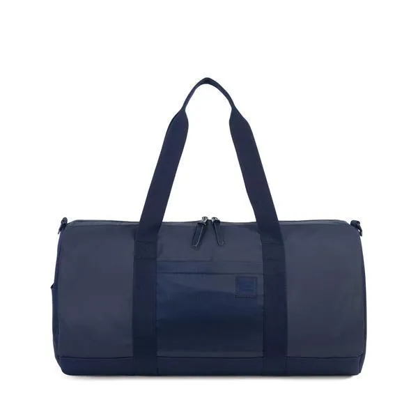 HERSCHEL - SUTTON DUFFLE (PEACOAT POLYCOAT/PEACOAT)