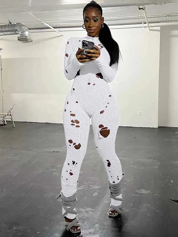 "Stylish T-BOO Women's Knit Ripped Jumpsuit: Elastic, Sexy, Hipster Long Sleeve Streetwear for Active Workouts"